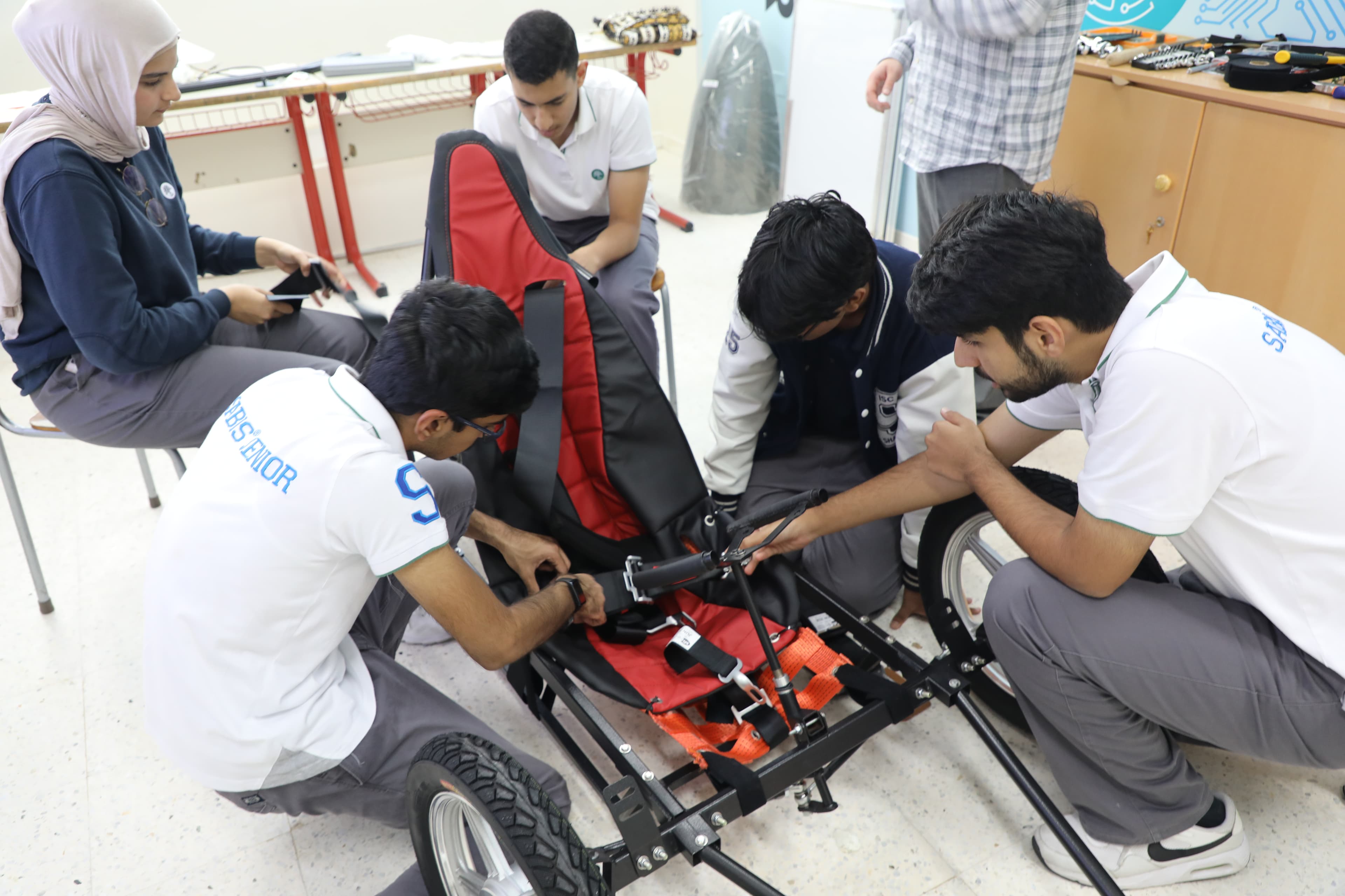 Team working on motor